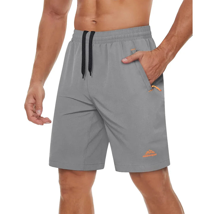 Svart herre shorts, hurtigtørkende og med glidelåslommer, for all trening.