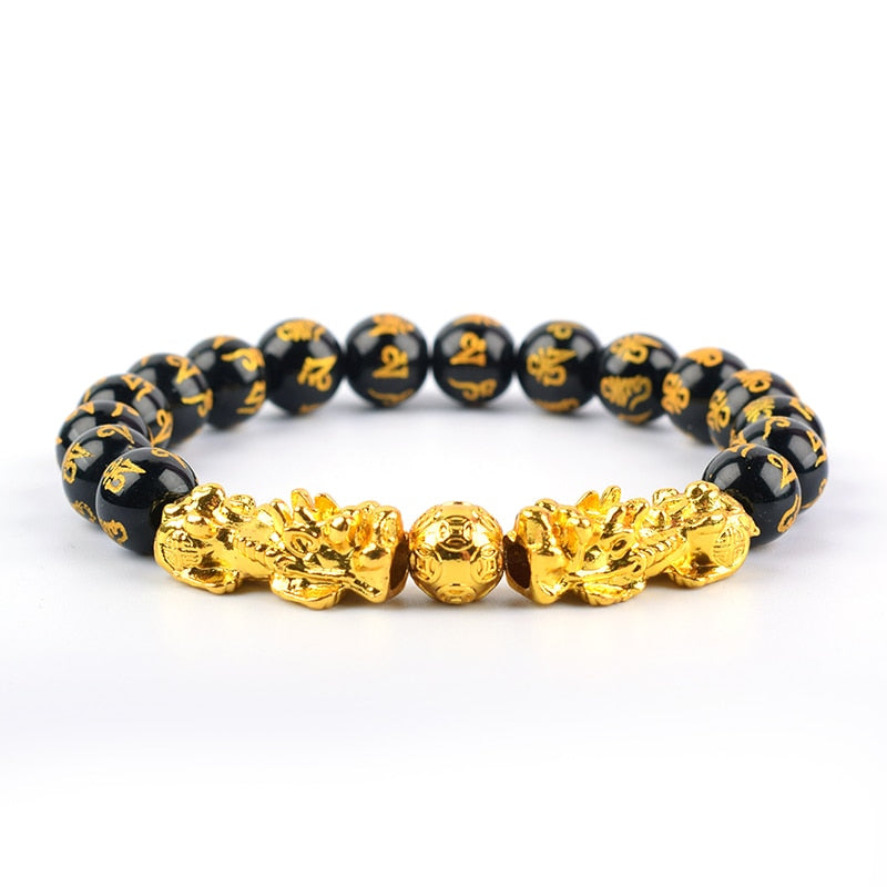 Det svarte obsidian Pi Xiu armbåndet fremmer velstand og beskytter mot negativ energi.