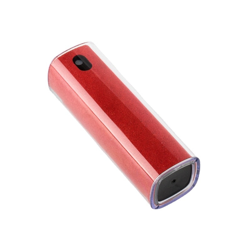 Kompakt skjermrens spray og mikrofiberklut, ideell for TV, laptop og smarttelefon.
