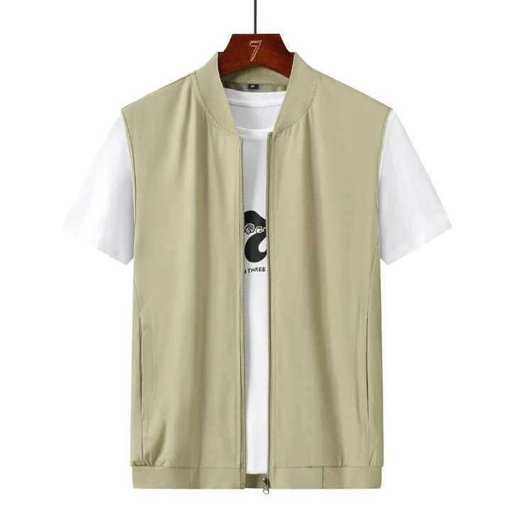 Funksjonell herre sportsvest i mesh, ideell for fiske, tur & sport. Med praktiske lommer.