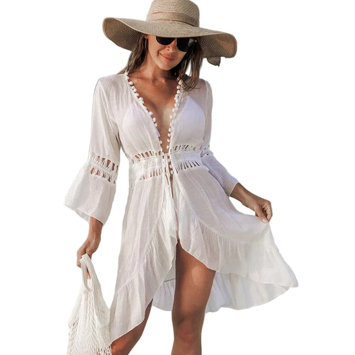Heklet boho strandkimono for kvinner med åpen front og dusker. Perfekt sommerstil.