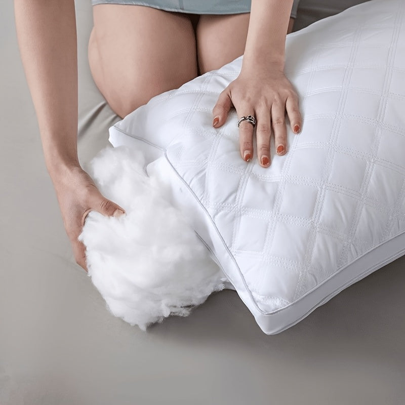 Nærbilde av en hvit 3D-pute med god støtte, perfekt for sovekomfort. Hypoallergenisk og pustende.