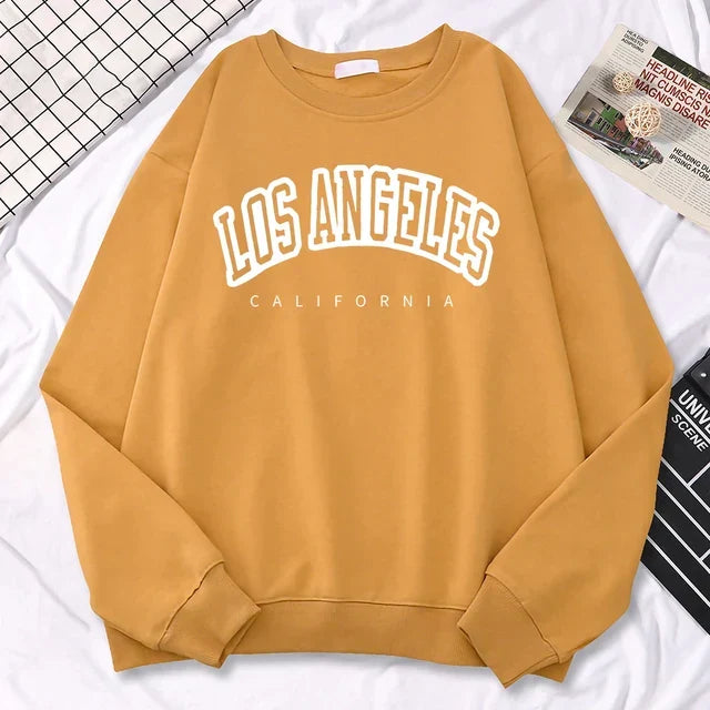 Grå Los Angeles-damegenser, myk pullover i bomullsblanding, ideell for kjølige dager.