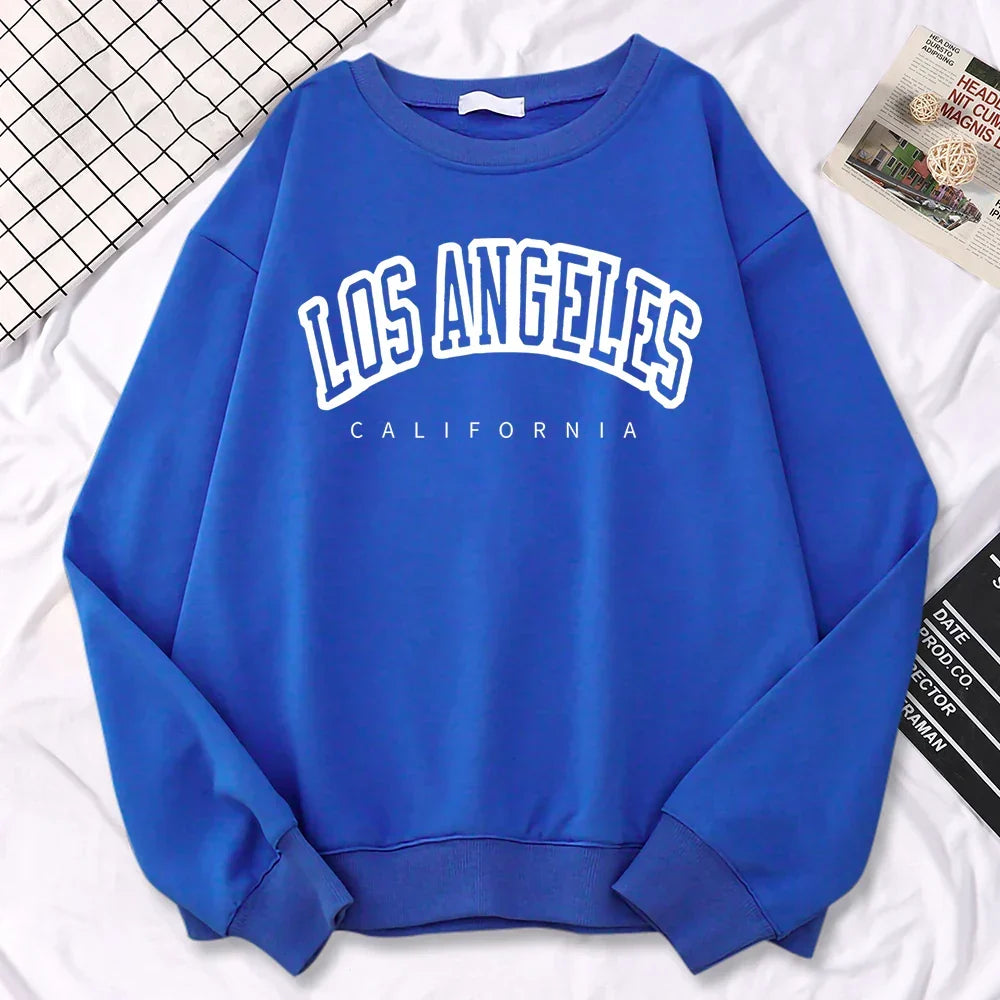 Dame Los Angeles-genser, komfortabel grå pullover i myk bomull, perfekt fritidsplagg.