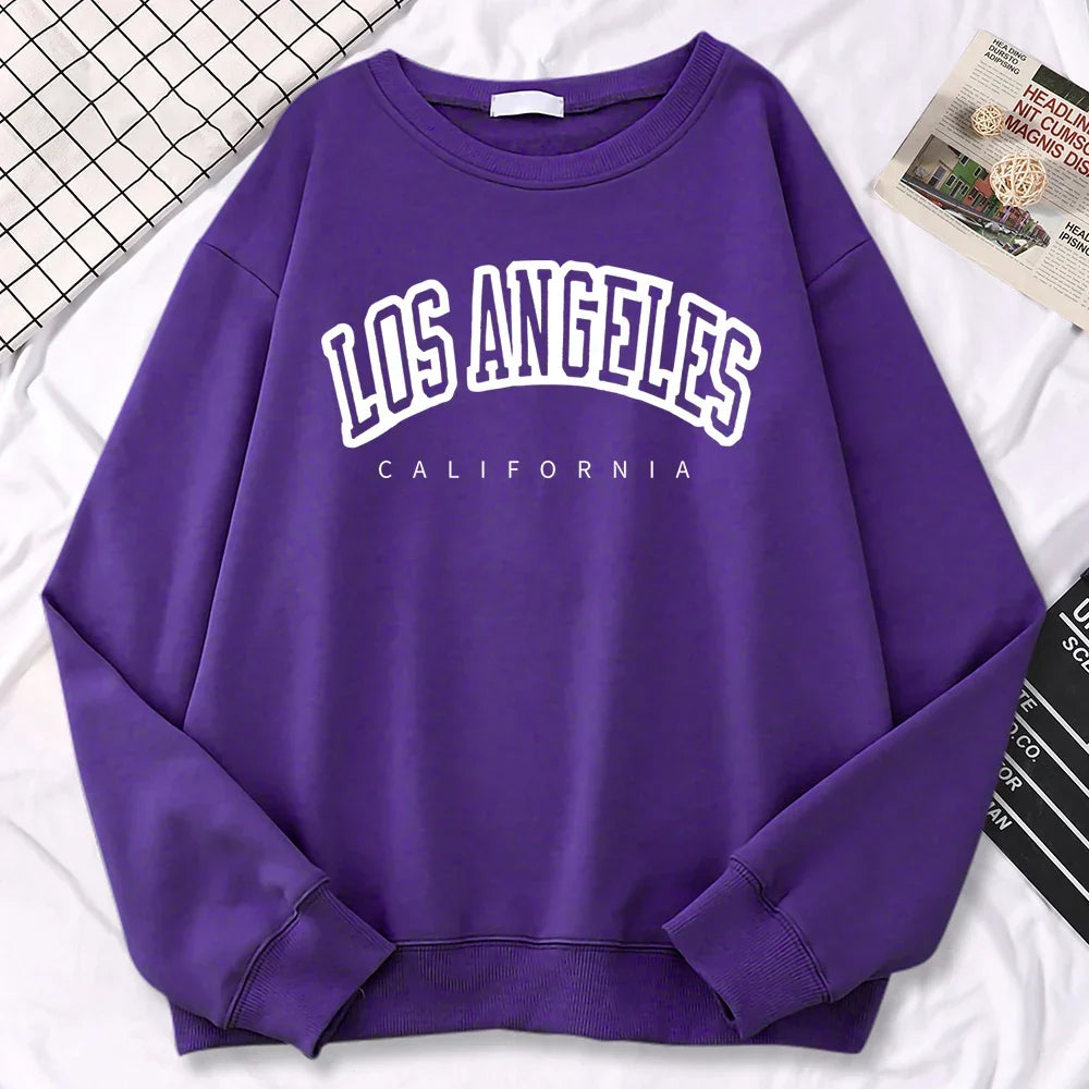 Trendsettende Los Angeles-pullover for kvinner, stilig overdel for en urban look.