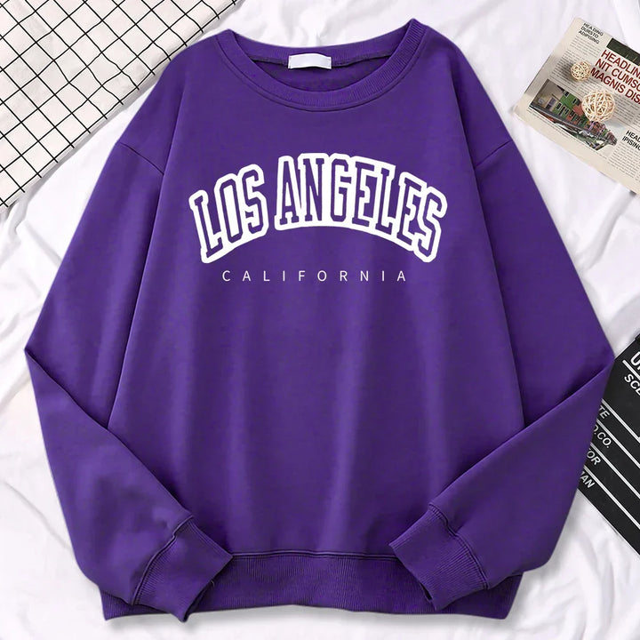 Trendsettende Los Angeles-pullover for kvinner, stilig overdel for en urban look.