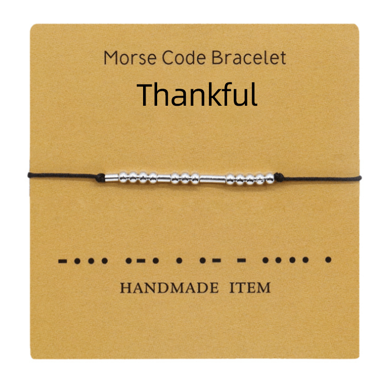 Et armbånd med historie: Unisex morsekode design for dype forbindelser.