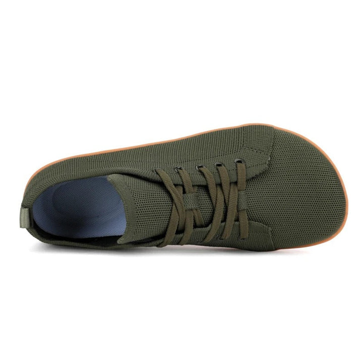 Svarte unisex barfot sko med fleksibel såle og bred tå, designet for fotvennlig komfort og bevegelsesfrihet.