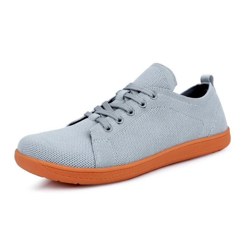 Fotvennlige barfot sneakers for sunn fotutvikling, med god plass til tærne og null dropp design.