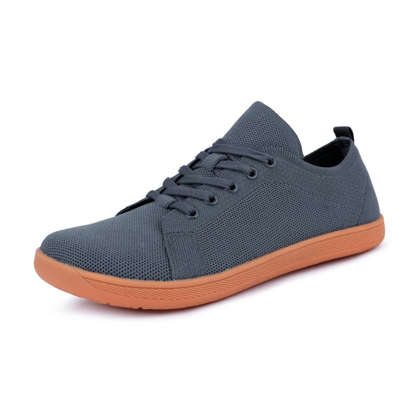Moderne minimalistiske barfot sneakers i unisex design, med en bred tåboks for uhemmet fotbevegelse.