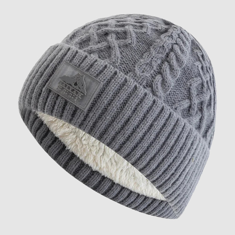 Tidløs unisex strikket lue i akryl med isolerende fleece. Allsidig tilbehør for mote og funksjon.