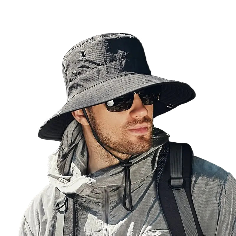 Unisex solhatt med bred rand, ideell for UV-beskyttelse under utendørsaktiviteter som fottur og camping.