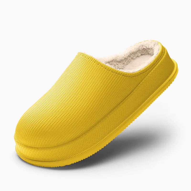Unisex tøfler med ullfôr, lettvektsdesign og dempet såle, perfekt for innendørs/utendørs bruk.