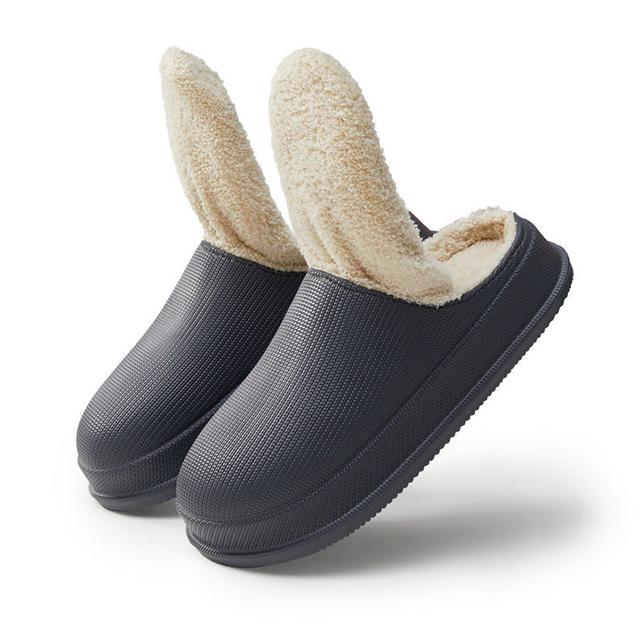 Stilige unisex tøfler med varmt ullfôr, ideelle for avslapning hjemme eller på hytta.