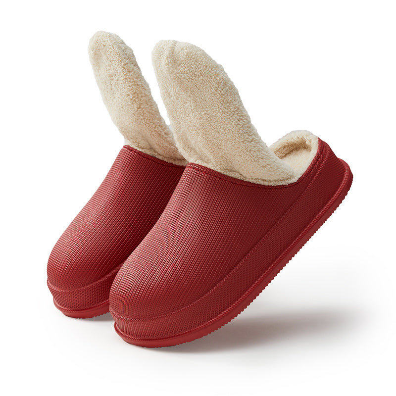 Unisex tøfler i slitesterkt materiale med ergonomisk design og mykt, varmt ullfôr.