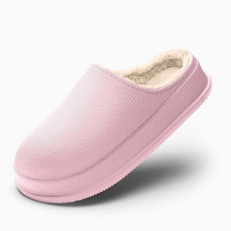 Detaljbilde av unisex tøflenes myke ullfôr som gir varme og en behagelig følelse.