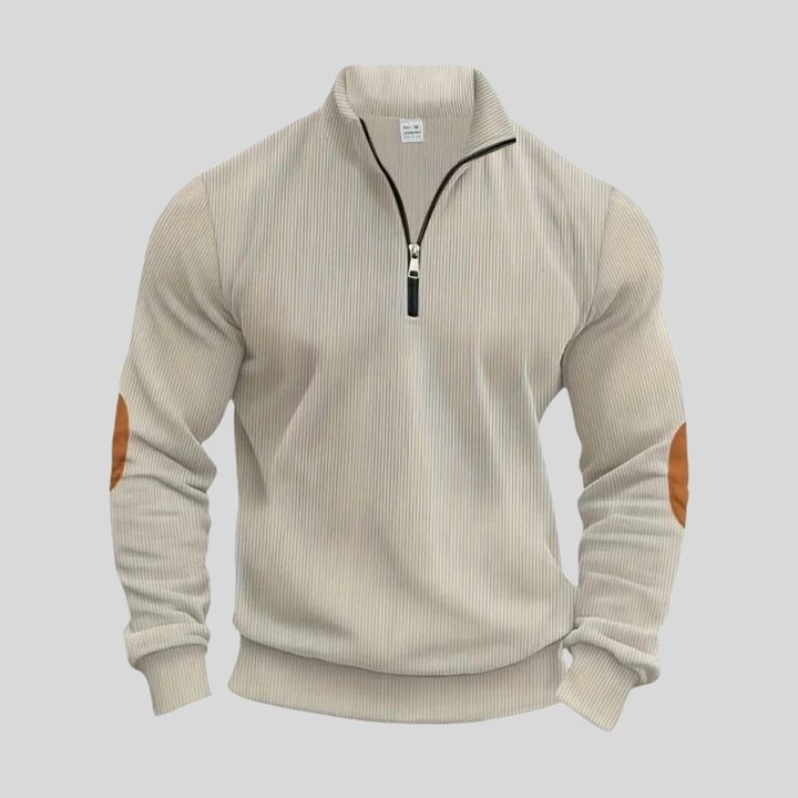 Klassisk menns pullover i strikk med ribbet mansjetter. Allsidig og elegant basisplagg for herre.