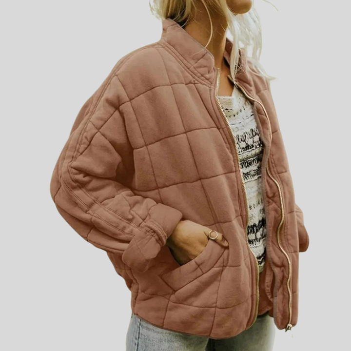 Kvinnejakke i bomullsblanding, oversized og stilfull, løs passform for en trendy look.