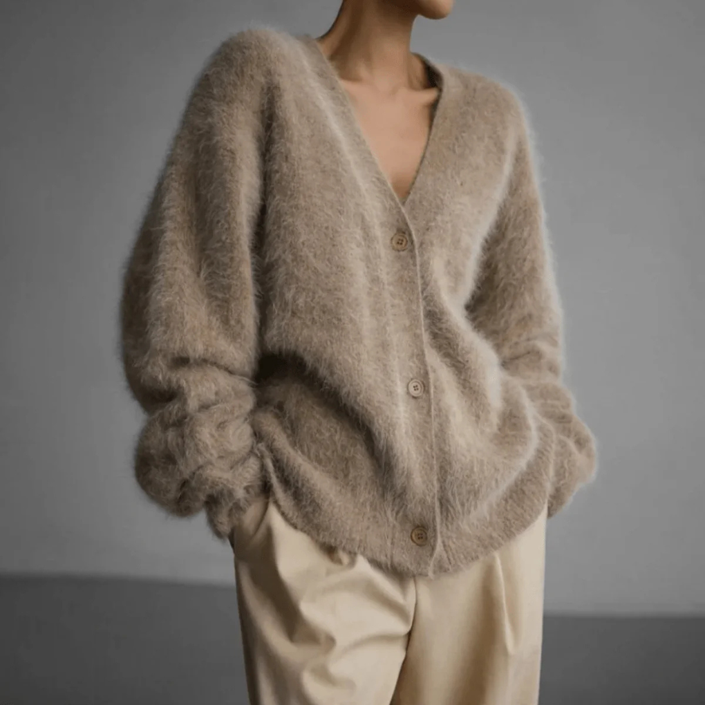 Fine-strikket kvinners cardigan med knapper, elegant og allsidig for hverdagsbruk eller fest.