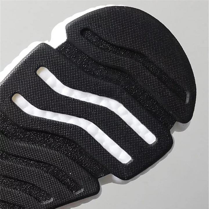 Sideprofil av stilige joggesko for menn, med lettvekt konstruksjon og ergonomisk design for sport.