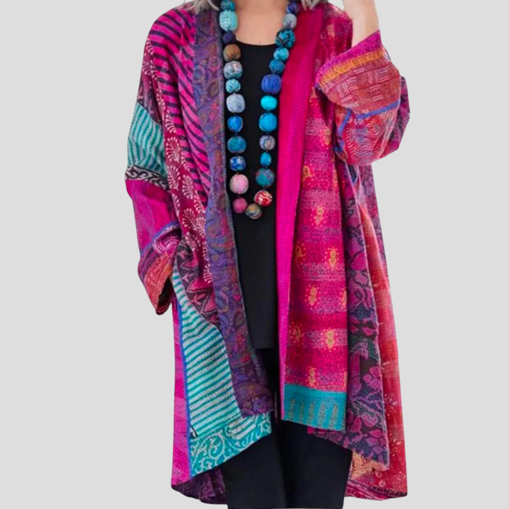 Elegant damecardigan med åpen front, gir et stilig og komfortabelt lagpålag til ethvert antrekk.