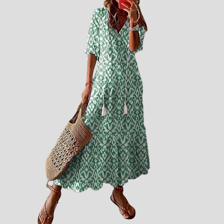 Smock maxikjole for kvinner. Komfortabel, lang bohemsk sommerkjole, perfekt som fritidskjole.
