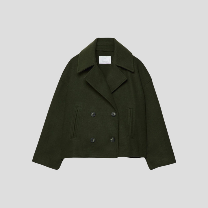 Trendy kvinnejakke, kort dobbeltknappet frakk. Ideell for kontorstil eller som moteriktig yttertøy.