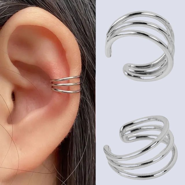 Gullbelagt spiral earcuff, minimalistisk design. Mote smykke uten piercing for hverdagsbruk.