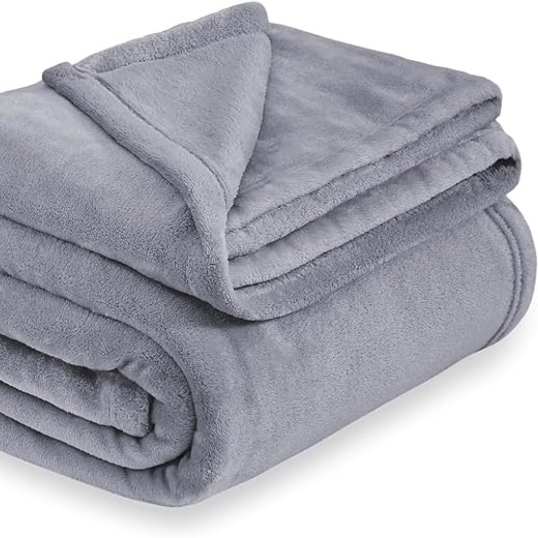 Koseteppe for stuen, et varmt og mykt polyester pledd i rektangulær form som forbedrer interiøret i hjemmet.