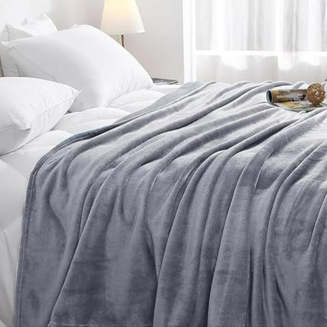 Allsidig mykt og varmt teppe for hjemmet. Rektangulært pledd i polyester, ideelt for koselig interiør overalt.