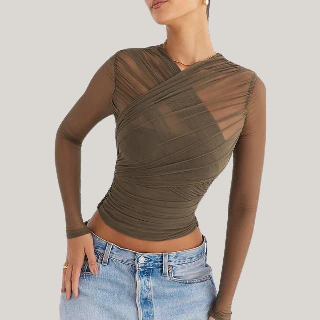 Dame omslagstopping i netting med lange ermer, V-hals og transparent stoff. Elegant & moderne festtopp.