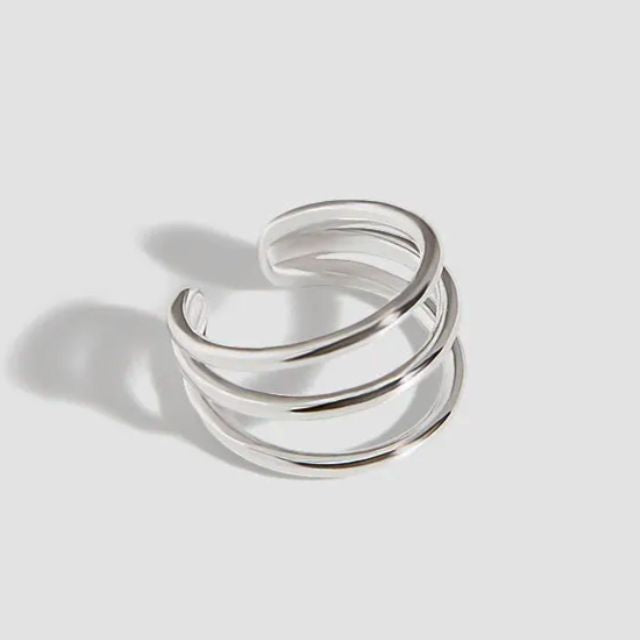 Tidløs sølv spiral øremansjett. Gi antrekket en touch av eleganse, ingen hull trengs.