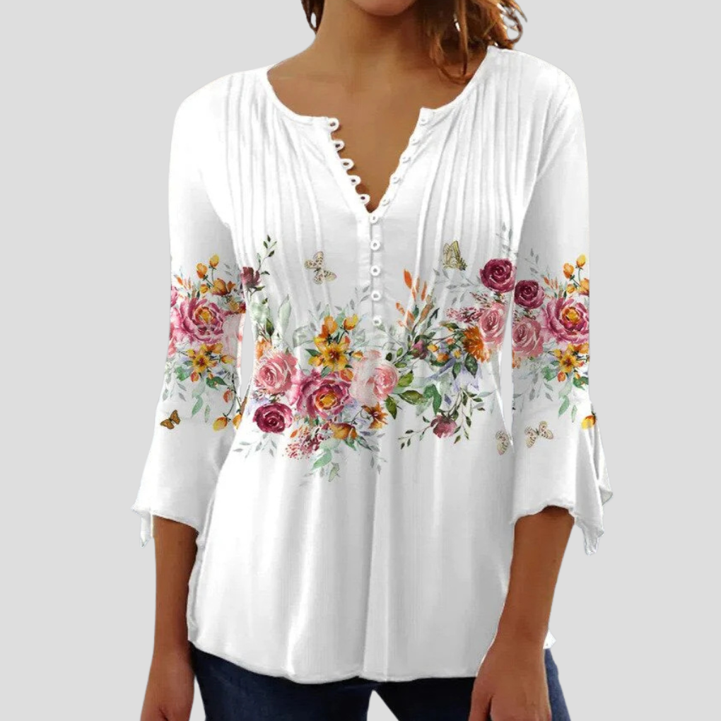 Elegant kvinners topp for hverdag og fest. Komfortabel, flerfarget sommertopp i klassisk stil.