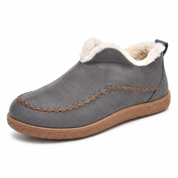 Dame høst/vinterstøvler. Elegante slip-on sko med varmt pelsfôr og komfortabel passform for kalde dager.