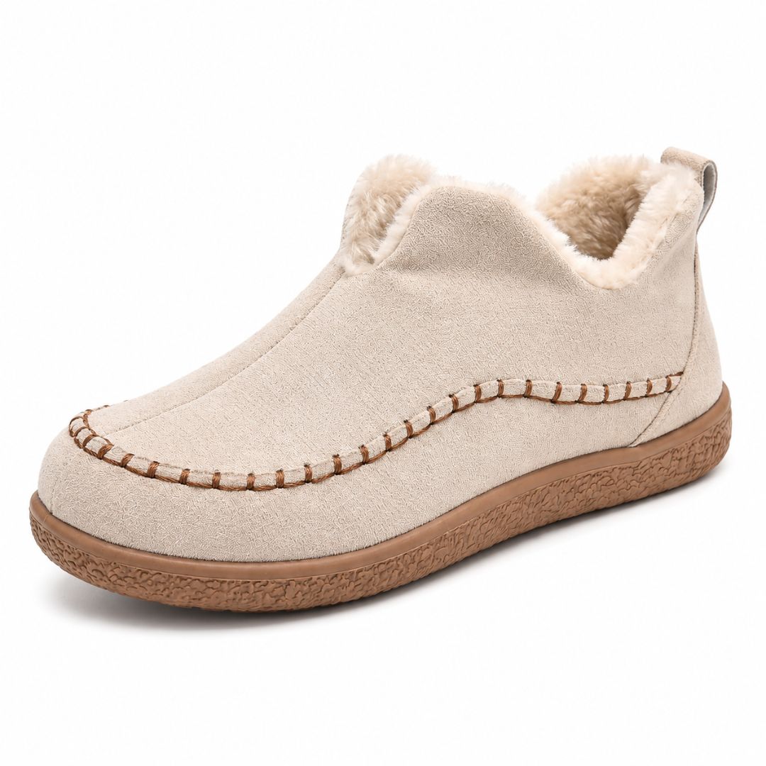 Praktiske slip-on vintersko for kvinner. Varme ankelstøvler med komfortabelt pelsfôr og solid gummisåle.
