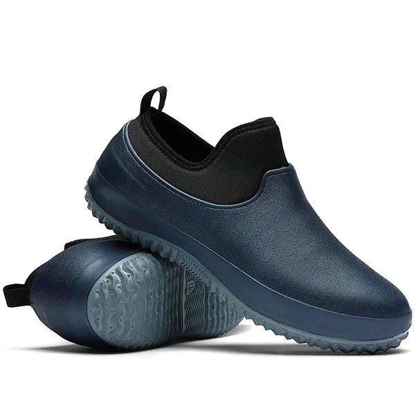 Detaljebilde av overflaten på vanntette slip-on arbeidssko. Materiale som sikrer tette sko og langvarig komfort.