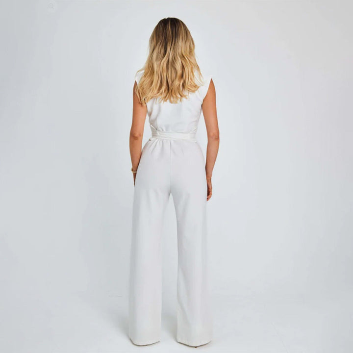 Khaki dame jumpsuit med vide ben. Komfortabel og moderne for hverdag eller fritid.