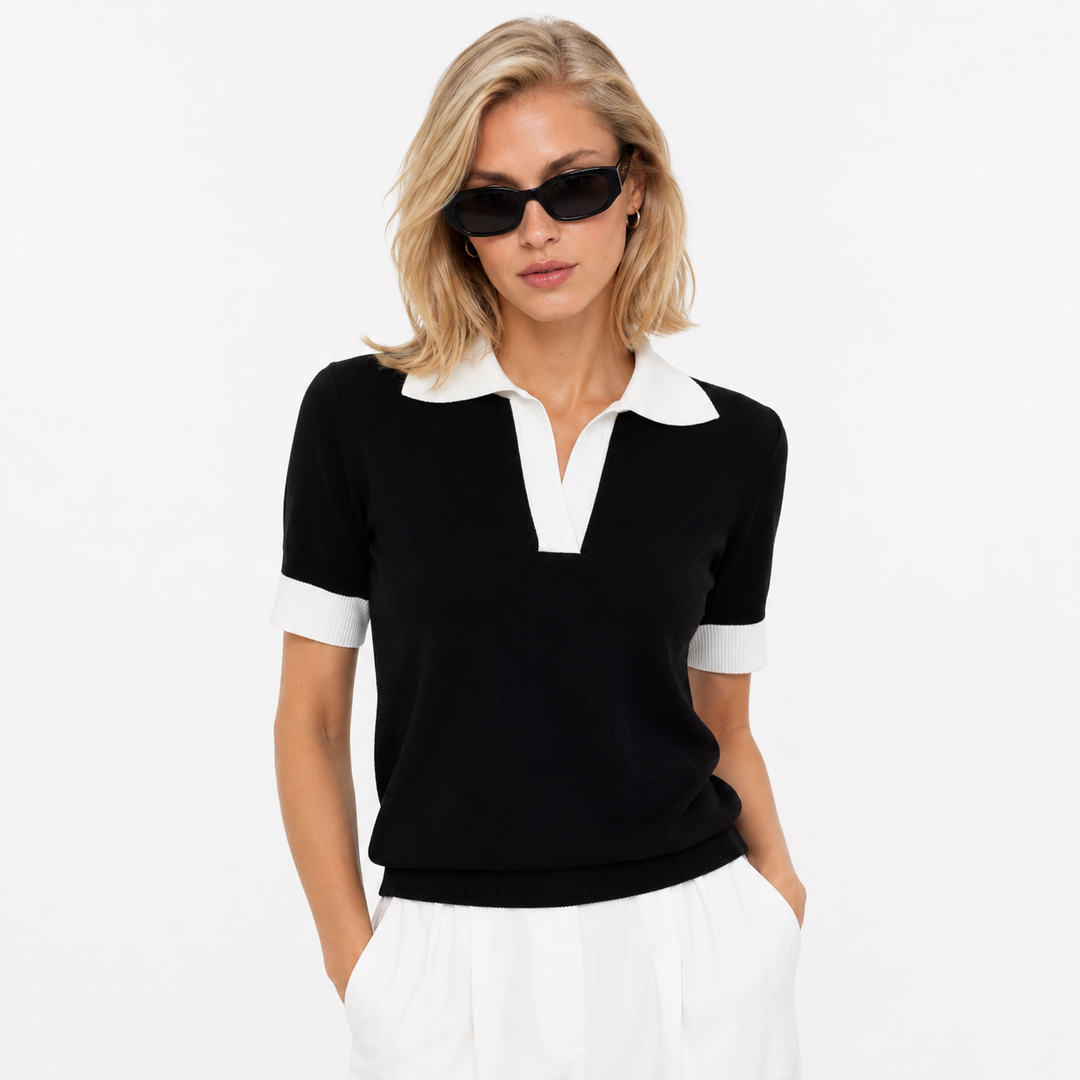 Elegant dame polo topp med korte ermer og stilige kontrastdetaljer. Perfekt for sommer, vår, fritid eller jobb.