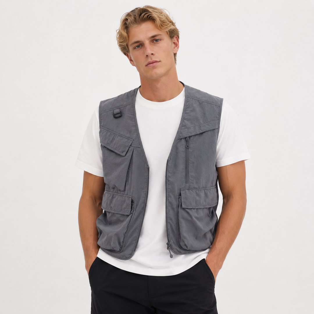 Unisex fritidsvest for dame/herre med mange praktiske lommer, ideell for utendørsaktiviteter.