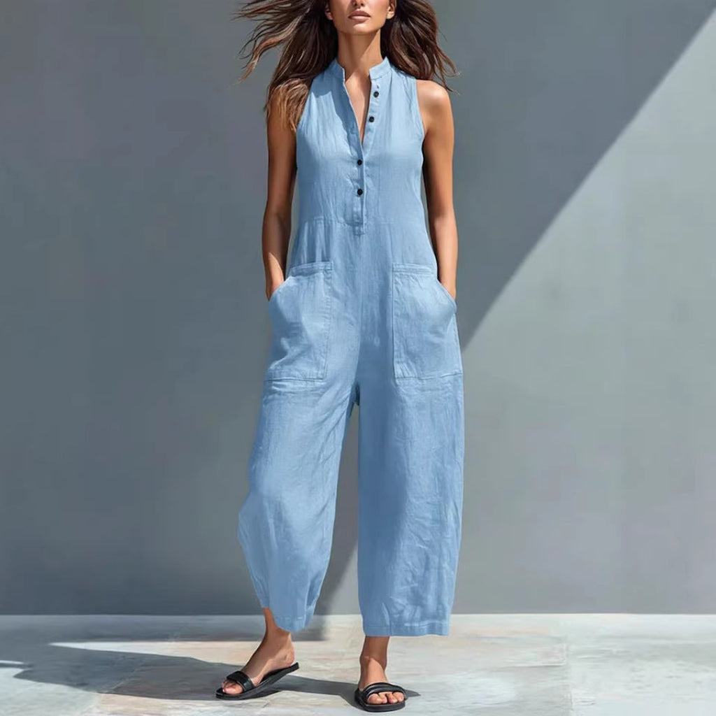 Elegant kvinne jumpsuit i avslappet passform, med V-hals, praktiske lommer og moderne vide ben.
