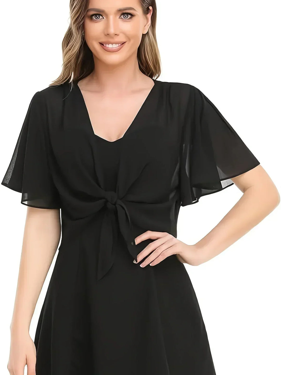 Elegant omslagsbluse for dame med vakker drapering og V-hals, perfekt for jobb eller hverdag.