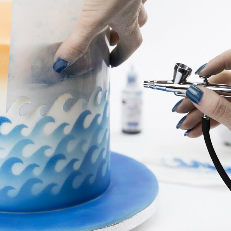 Airbrush sett for kakepynt og kakedekorering; gir profesjonelle, detaljerte resultater på desserter.