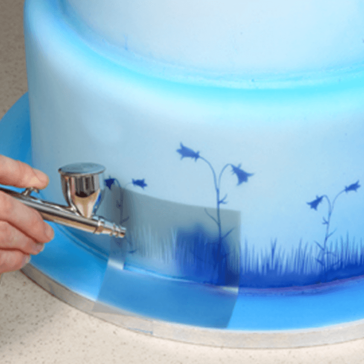 Kakepynt airbrush sett med kompressor og pistol for enkel og kreativ kakedekorering og matlaging.