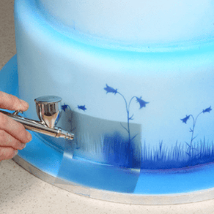 Kakepynt airbrush sett med kompressor og pistol for enkel og kreativ kakedekorering og matlaging.