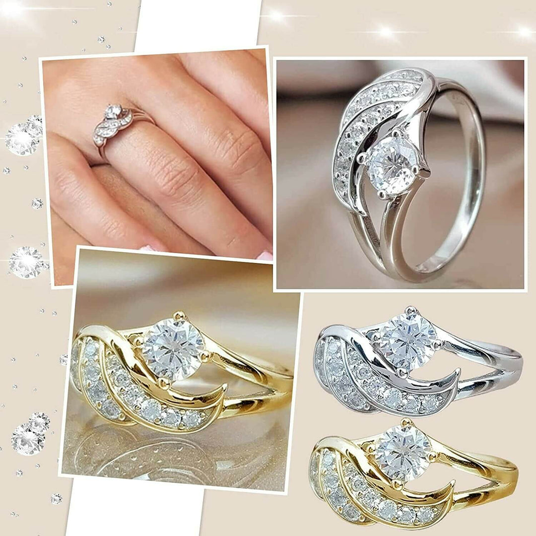 Unik dame ring med utsøkt englevinge og strålende cubic zirconia. Et tidløst smykke.