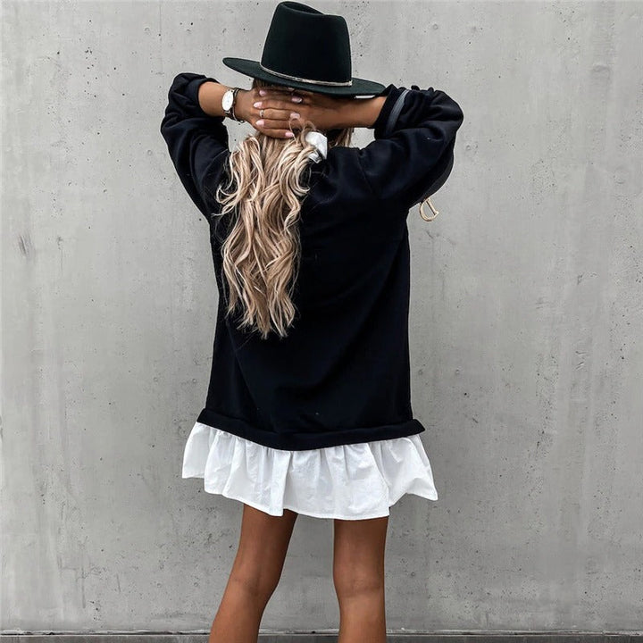 Stilfull høst/vinter kjole for dame. Elegant krage og lange ermer for en chic og varm look.