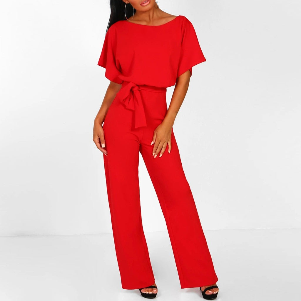 Dame jumpsuit med elegante blonderdetaljer, brede ben og slank passform. Ideell for festantrekk.