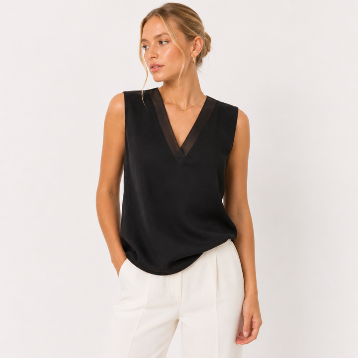 Elegant silkemyk satengbluse til dame, perfekt for tidløs stil og moderne mote.