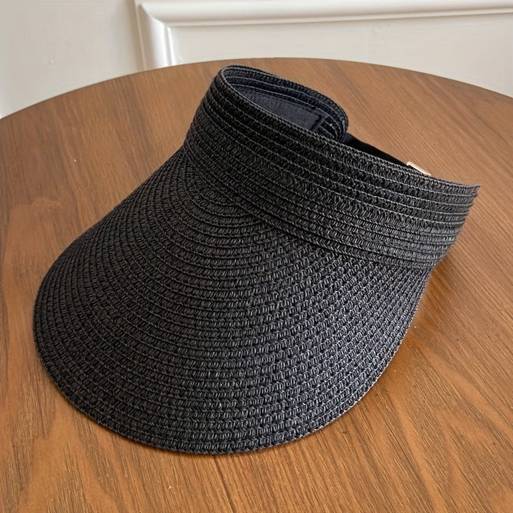 Dame strandhatt, foldbar og med bred brem. Gir god solbeskyttelse og er lett å pakke.