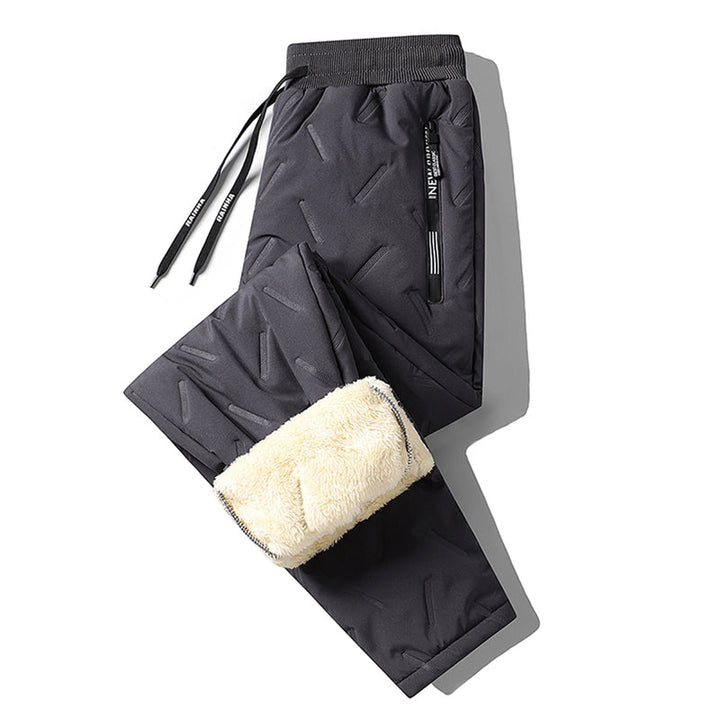 Stilige og funksjonelle varmebukser i unisex design, med mykt fleecefôr for vinterbruk.
